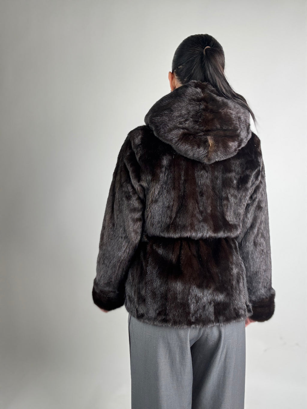 Mink jacket with belt and hood